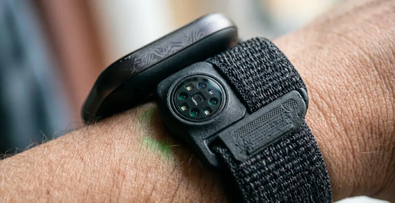 Wearable fitness device capturing health metrics for insurance wellness programs